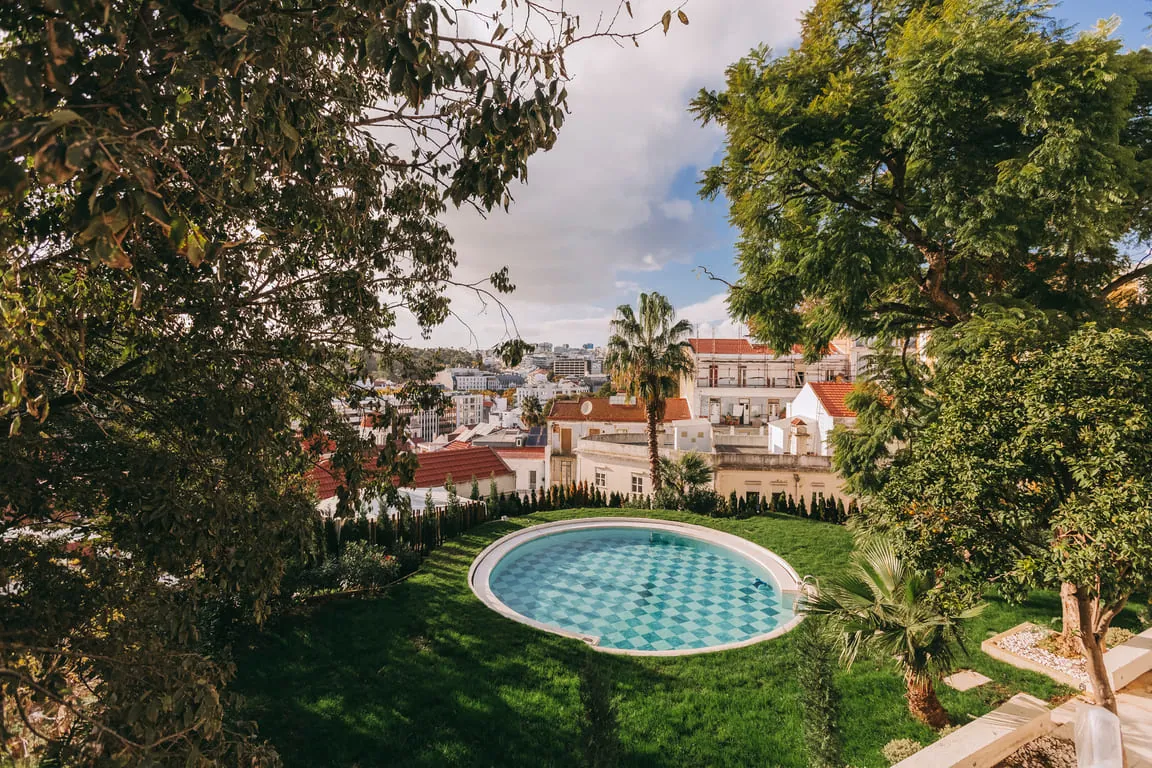 Torel garden pool with the city beyond